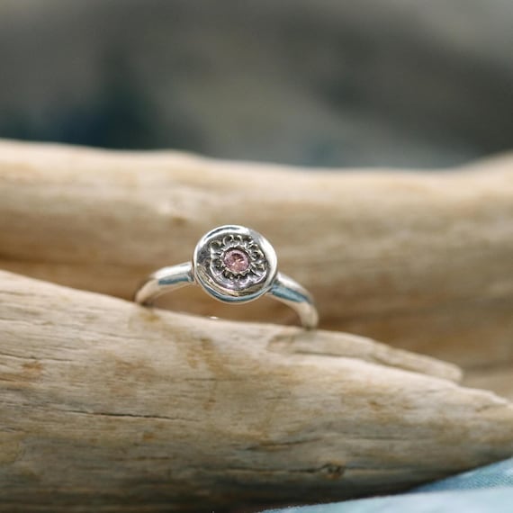 Handmade, sterling silver, coin-shaped, sun, pink tourmaline