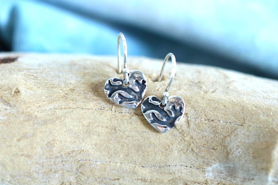 Sterling Silver, Heart Shape, Coin Earrings with Antique Coral Inprint.