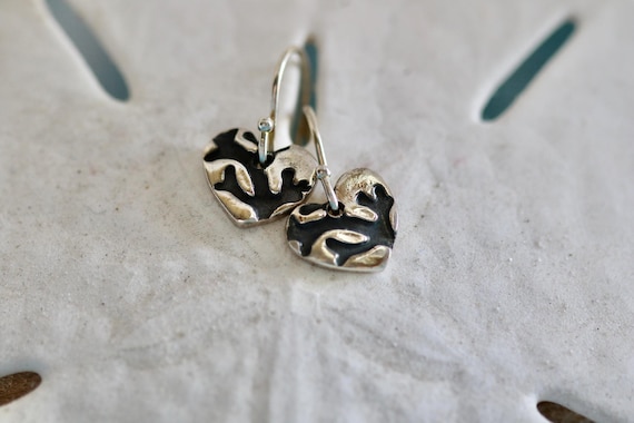 Sterling Silver, Heart Shape, Coin Earrings with Antique Coral Inprint.