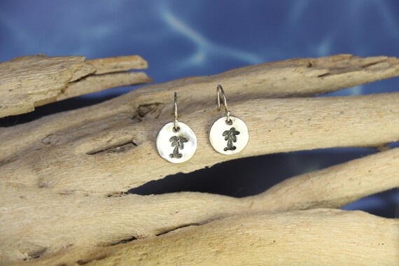 Sterling silver coin earrings with antiqued palm trees.