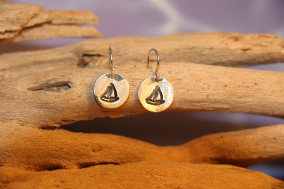 Sterling and Fine Silver Antiqued Sailboat Disk Earrings.