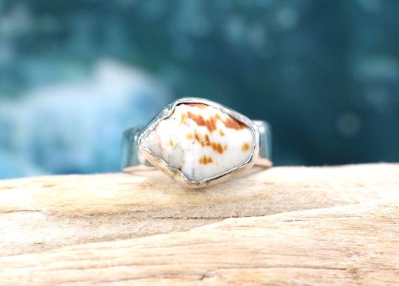 Sterling Silver Band with a Bezel Set Dove Shell