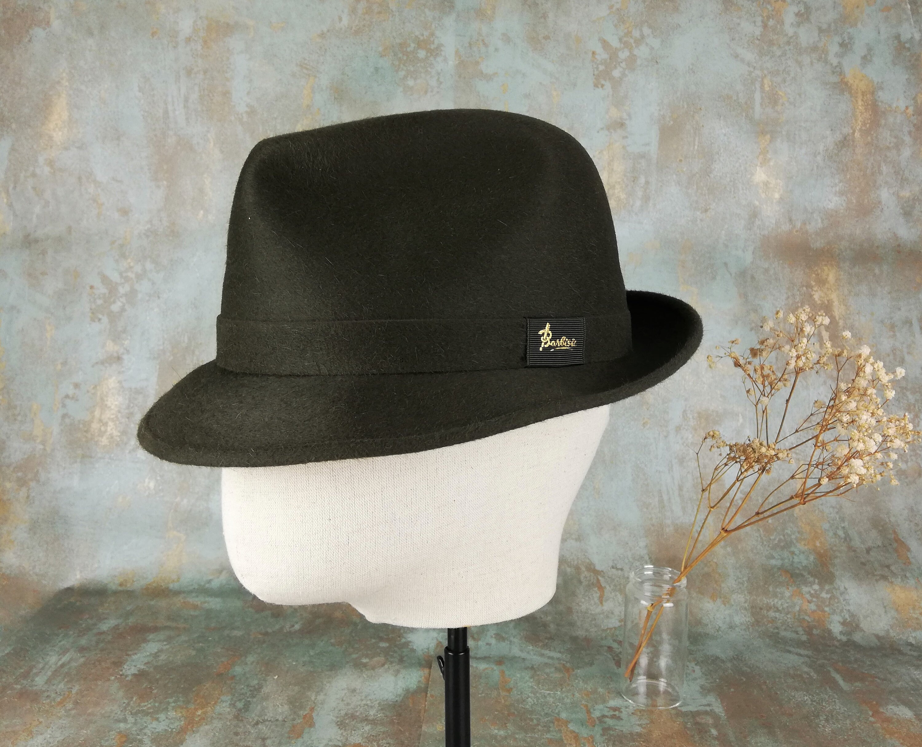 green trilby hat