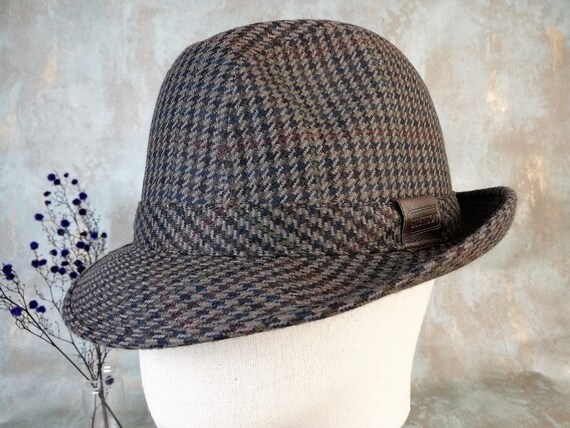 narrow brimmed felt hat with dented crown