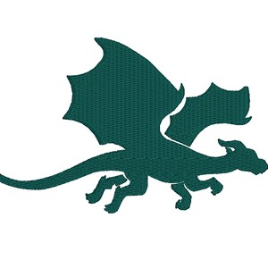 May include: A teal green silhouette of a dragon with wings spread out, flying in mid-air.