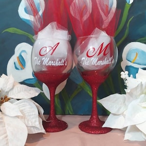 Cute Personalized Wine Glasses for 2 w/glitter bottom. Initial on the front w/short saying on the back. Choose your colors. Great Gift Idea!