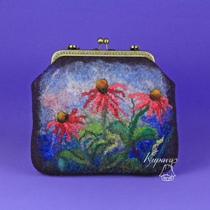 May include: A small, dark brown felt clutch bag with a brass clasp. The bag features a hand-painted design of three red and pink flowers with green leaves against a blue and white background. The text "Kupava" is visible in the lower right corner of the bag.