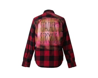 Bleached flannel.   Size Small. Teacher Strong