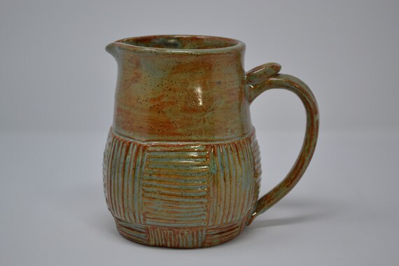 Handmade Speckled Stoneware Pitcher in Rust and Greens