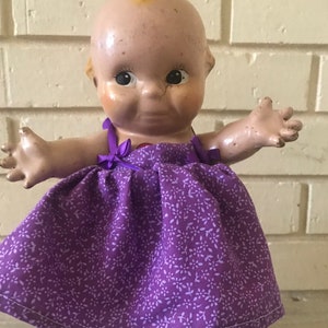 Kewpie Doll, Antique Kewpie Doll by Rose O Neill, Wings,  Composition doll, Heart on chest,