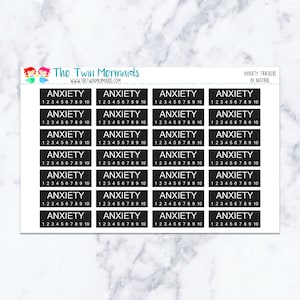 May include: Sheet of stickers with the text "ANXIETY" in a black rectangle, with numbers 1-10 below. The stickers are labeled "ANXIETY TRACKERS IN NEUTRAL" and have the website "WWW.THETWINMERMAIDS.COM" at the top.