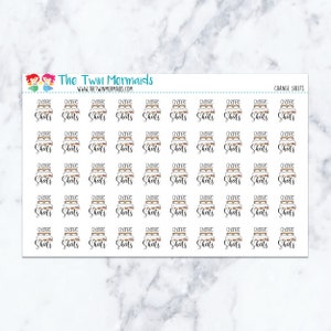 May include: A sheet of stickers with the text "Change Sheets" in a handwritten font. The stickers feature a bed with a blanket and pillows. The top left corner has a logo with two mermaids and the text "The Twin Mermaids".