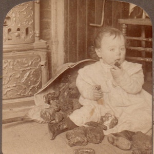 1903 Baby Making Mess Eating Coal. Underwood Stereoview Photo