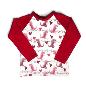 RTS Dinosaurier Raglan Tee 2T, Unisex Raglan Tee, Mädchen Raglan Tee, Mädchen Casual Tee, Mädchen Baseball Tee, Jungen Raglan Tee, Jungen Baseball Tee.