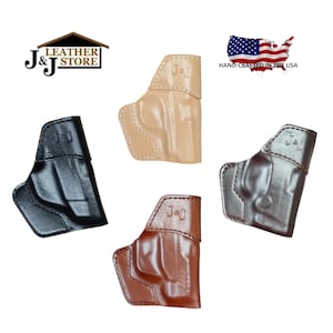May include: Four leather holsters in black, tan, brown, and dark brown, each featuring the embossed J&J logo. The image includes the J&J Leather Store logo and a graphic of the United States flag with the text HAND CRAFTED IN THE USA.