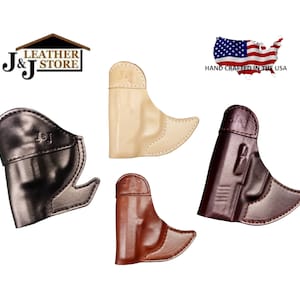 May include: Four leather gun holsters in different colors: black, tan, brown, and burgundy. The holsters are all made of leather and have a J&J logo embossed on them. Handcrafted in the USA.