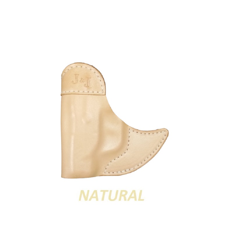 May include: A natural leather holster with the initials "J&J" embossed on the top.