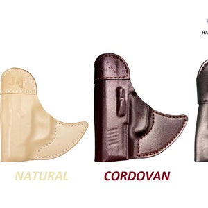 May include: Four leather holsters in different colors: brown, natural, cordovan, and black. Each holster has a J&J logo embossed on the side. The holsters are handcrafted in the USA.