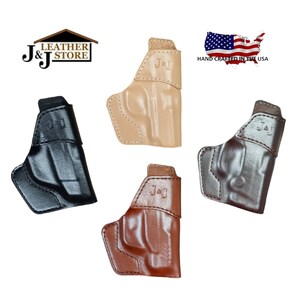 May include: Four leather holsters for concealed carry, in black, brown, tan, and light brown. The holsters are made by J&J Leather Store and are hand-crafted in the USA.