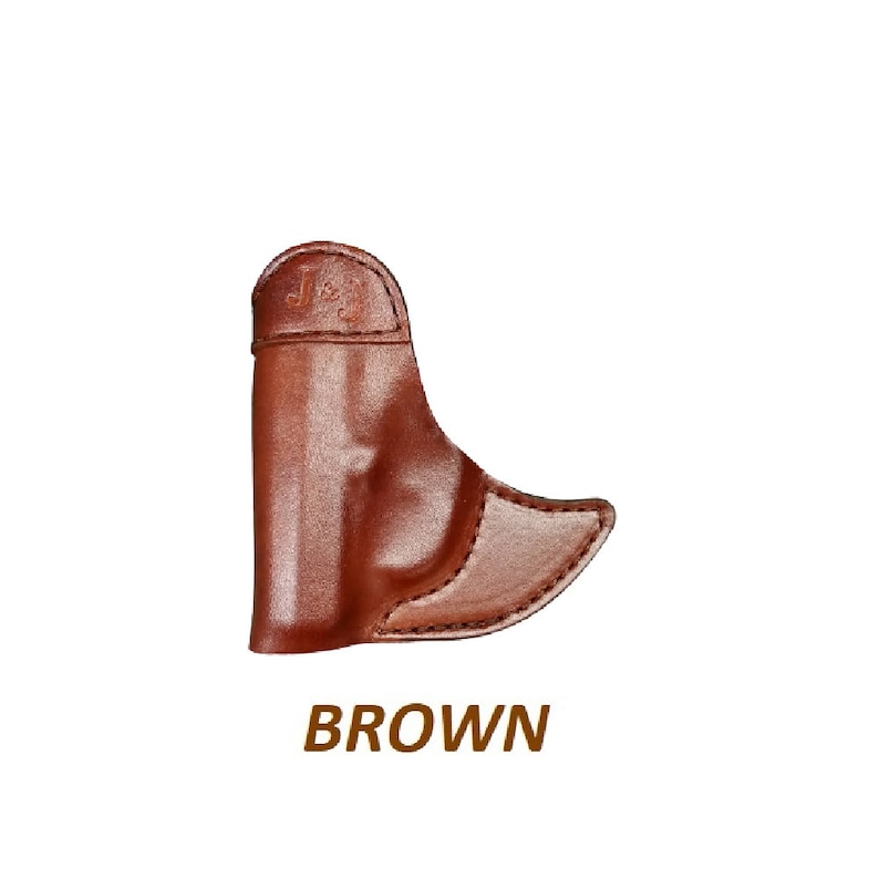 May include: A brown leather holster with a stitched design. The holster has the letters "J & J" embossed on the top.