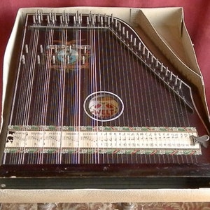Guitarra 5/7 o cítara sin trastes