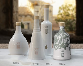 May include: Four ceramic olive oil bottles with cork stoppers. The bottles are white with different designs. The bottles are labelled "Your Logo".