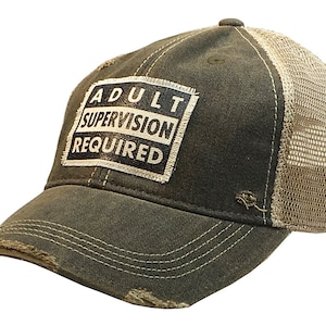 May include: A dark green and beige distressed trucker hat with a black patch that reads "Adult Supervision Required".