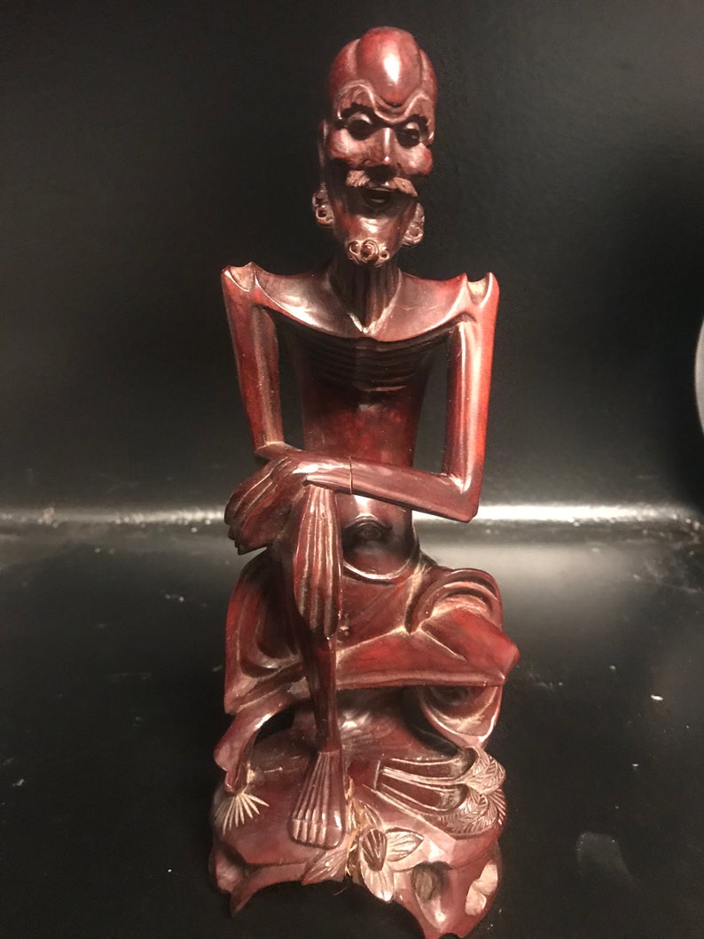Vintage wood walnut carving of Asian Man