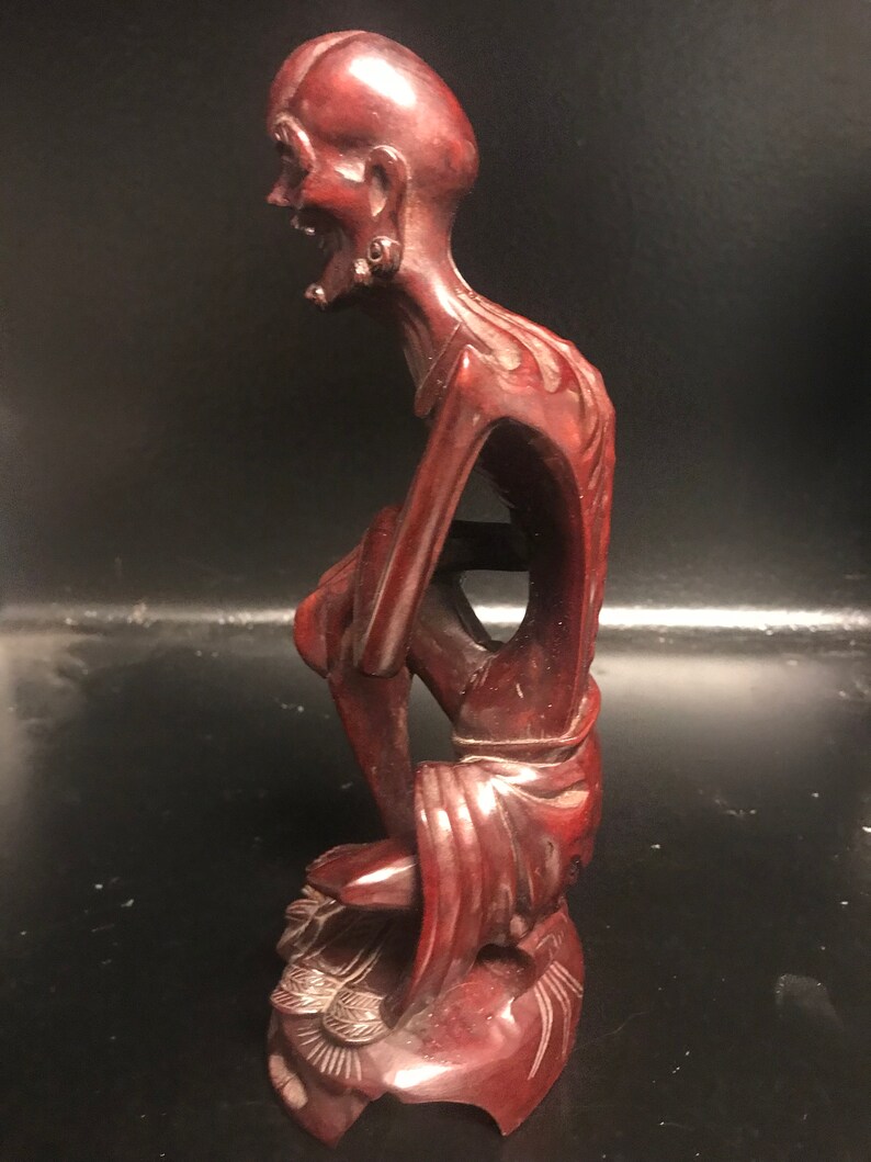 Vintage wood walnut carving of Asian Man