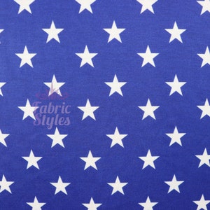 May include: A blue fabric with a white star pattern. The stars are evenly spaced and are a classic five-pointed star shape.