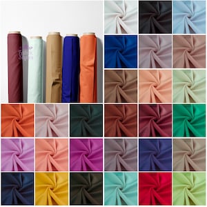 Plain Scuba Jersey Fabric | Sold by the metre | Available in 25+ vibrant colors | Soft & Stretchy | Perfect for fashion, clothing, dresses