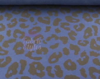 May include: Close-up of a blue fabric with a leopard print pattern in shades of brown. The fabric is rolled up, and the words "Fabric Styles" are visible in the center.