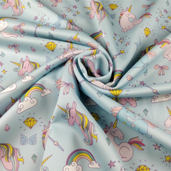 FS169_3 Blue Base Unicorn Rainbow Print en tela de buceo elástica de jersey de alta calidad - (por metro)