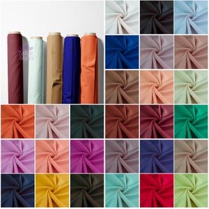 Plain Scuba Jersey Fabric | Sold by the metre | Available in 25+ vibrant colors | Soft & Stretchy | Perfect for fashion, clothing, dresses