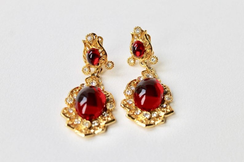 Rhinestones Indian inspired earrings Faux ruby cabochon chandelier earrings. Vintage Sphinx gold and red cabochon dangle clip on earrings