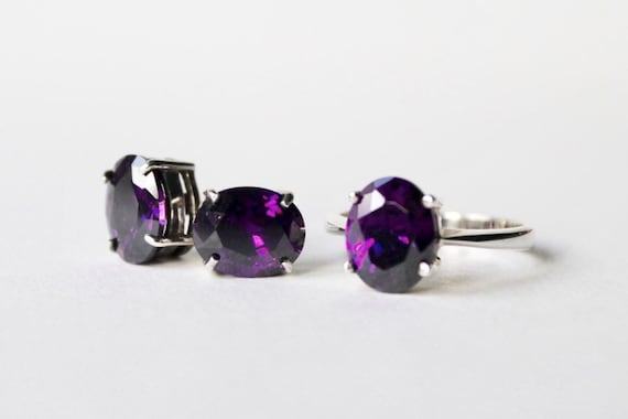 Vintage sterling silver amethyst ring and earrings set. Faux Amethyst cubic zirconia rich purple oval earrings and solitaire ring. CZ ring.