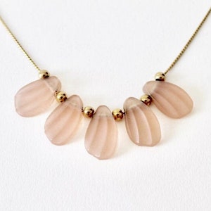 Vintage Avon rose pink frosted scalloped glass bead necklace. Avon gold bead spacer antique pink frost shape shell glass bead bib necklace.
