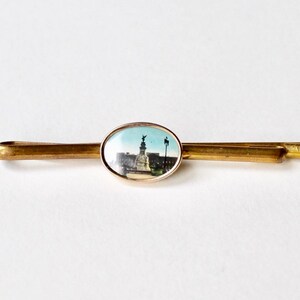 Vintage Victoria Memorial monument tie slide. Bronze tone souvenir London tie slide oval photograph The Victoria Memorial Buckingham Palace.