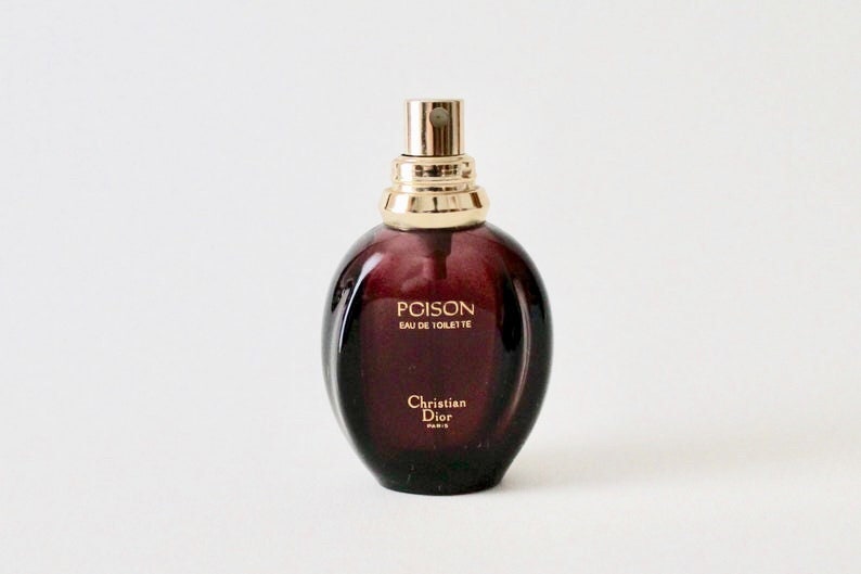 poison perfume black bottle