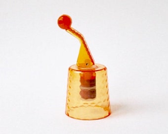 Vintage retro plastic orange bottle stopper with plug. Bottle plug. Soda stopper soda plug. 1970's plastic orange transparent drink stopper.