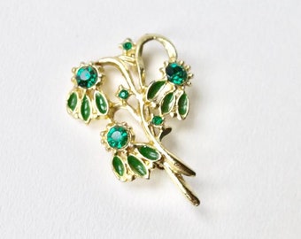 Vintage gold green rhinestone green enamel flower brooch. Gold tone faceted green rhinestone floral brooch. Green enamel leaf brooch.