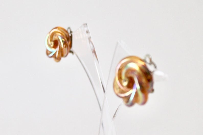 1950/'s twist knot statement orange rainbow coated tubular knot clip on earrings. Vintage orange rainbow lustre knot clip on earrings