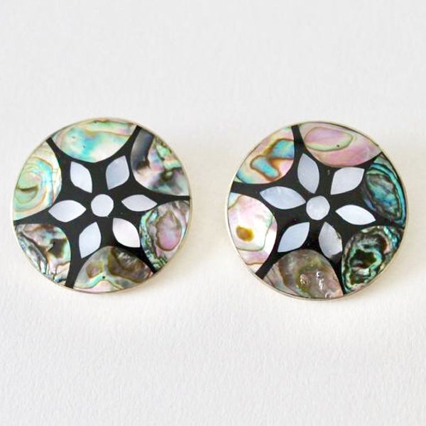 Vintage Alpaca Mexico silver round abalone mother of pearl flower shape inlay clip on earrings. Abalone paua MOP floral rainbow earrings.