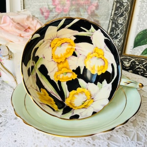 Black Paragon Teacup and Saucer with White and Yellow Daffodils, Green Foot and Handle, Double Warrant Wide Mouth, Vintage English Tea Set