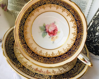 Paragon Tea Cup and Saucer Cream, Cobalt Blue and Gold Double Warrant with Pink Floating Roses, Heavy Gold Chintz, English Tea Set