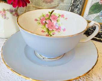 Baby Blue Teacup and Saucer by Royal Floral Bone China with Pink Blossoms