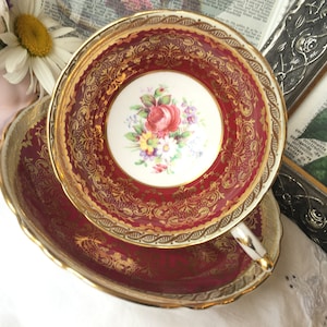 Paragon Red and Gold Double Warrant Tea Cup and Saucer with White and Yellow Daisies, Purple Blooms, Heavy Gold Chintz, English Tea Set