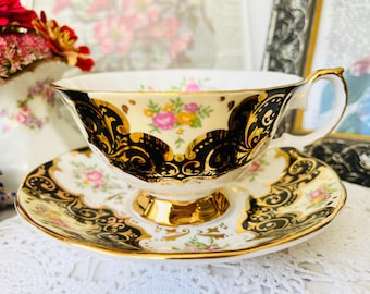 Vintage Elizabethan Staffordshire Teacup Set: Black, Gold, and Rosebuds