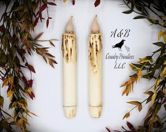 Juego de (2) velas cónicas LED de 18 cm con temporizador, color blanco roto, con iluminación LED y cera. Funcionan a pilas. Decoración rústica para el hogar.