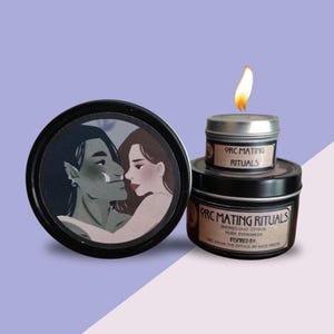 May include: A black candle tin with the text "PRC MATING RITUALS" and a lit wick. The candle is stacked on top of another tin with the same text. A third tin features an illustration of two figures embracing.